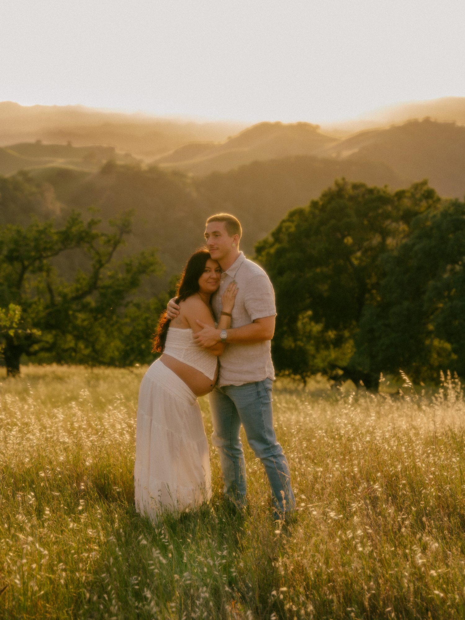 Couple dancing at sunset